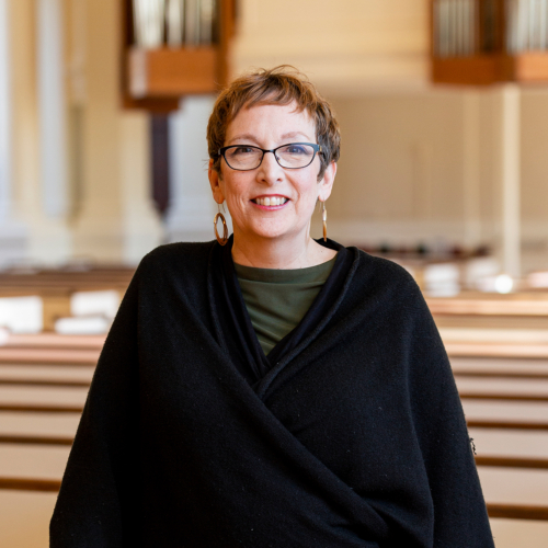 Christine Toppin Riordan in the pews of Village Church