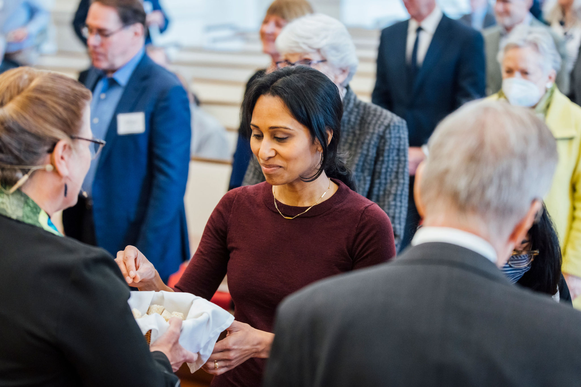 Woman takes communion