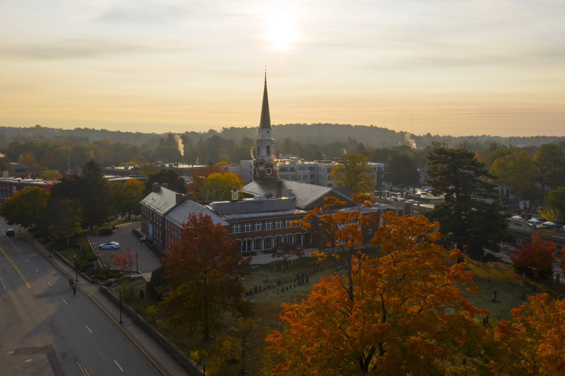 Steeple rises up above treetops
