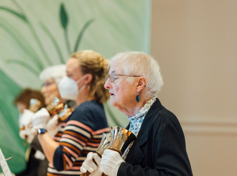 Handbell choir rehearses